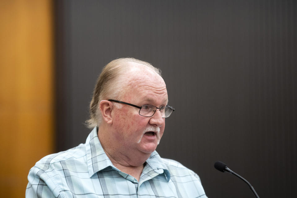 Ken Smith, brother of Katie Maggiore, makes a statement as Joseph James DeAngelo is in the courtroom during the third day of victim impact statements at the Gordon D. Schaber Sacramento County Courthouse on Thursday, Aug. 20, 2020, in Sacramento, Calif. DeAngelo was known as the East Area Rapist by Feb. 2, 1978, when he fatally shot Katie Maggiore, 20, and Brian Maggiore, 21, as they walked their dog around their Rancho Cordova neighborhood in Sacramento County. DeAngelo pleaded guilty in June to 13 murders and 13 rape-related charges stemming from crimes in the 1970s and 1980s. (Santiago Mejia/San Francisco Chronicle via AP, Pool)