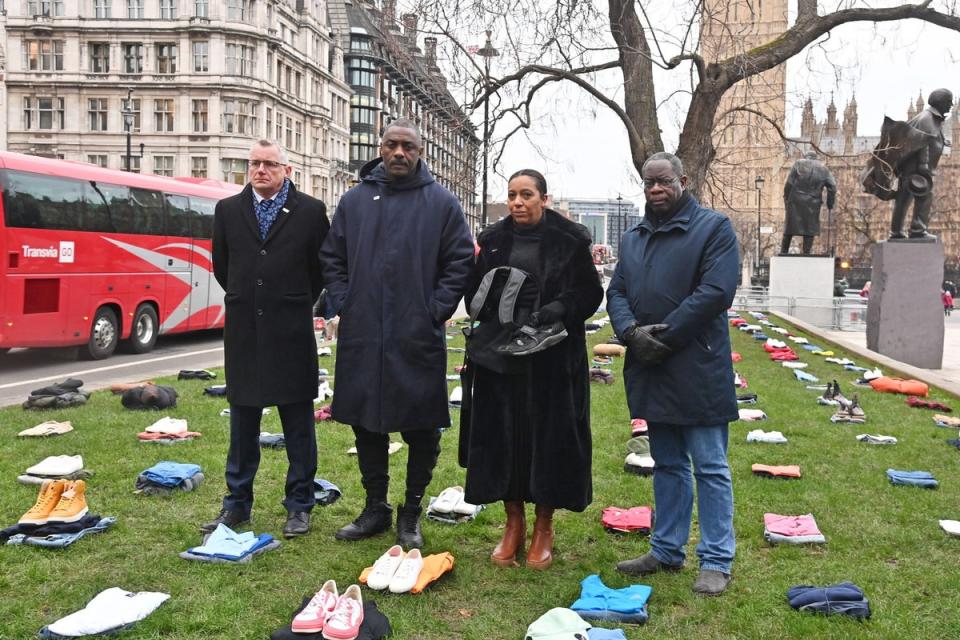 CEO of The Ben Kinsella Trust Patrick Green, Idris Elba, Yemi Hughes, mother of Andre Aderemi, and Bishop Mark Nicholson (Alan Chapman/Dave Benett/Getty I)