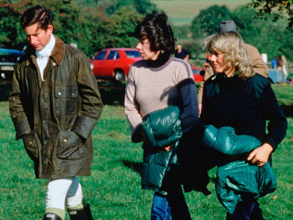 King Charles III walks with Lady Sarah Keswick and Camilla Parker Bowles in 1979.