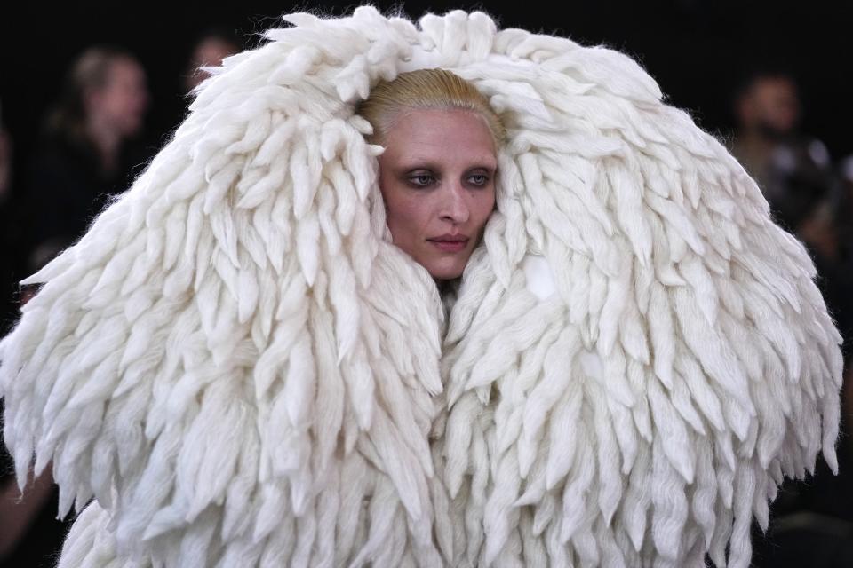 A model wears a creation for the Schiaparelli Haute Couture Fall/Winter 2023-2024 fashion collection presented in Paris, Monday, July 3, 2023. (AP Photo/Michel Euler)