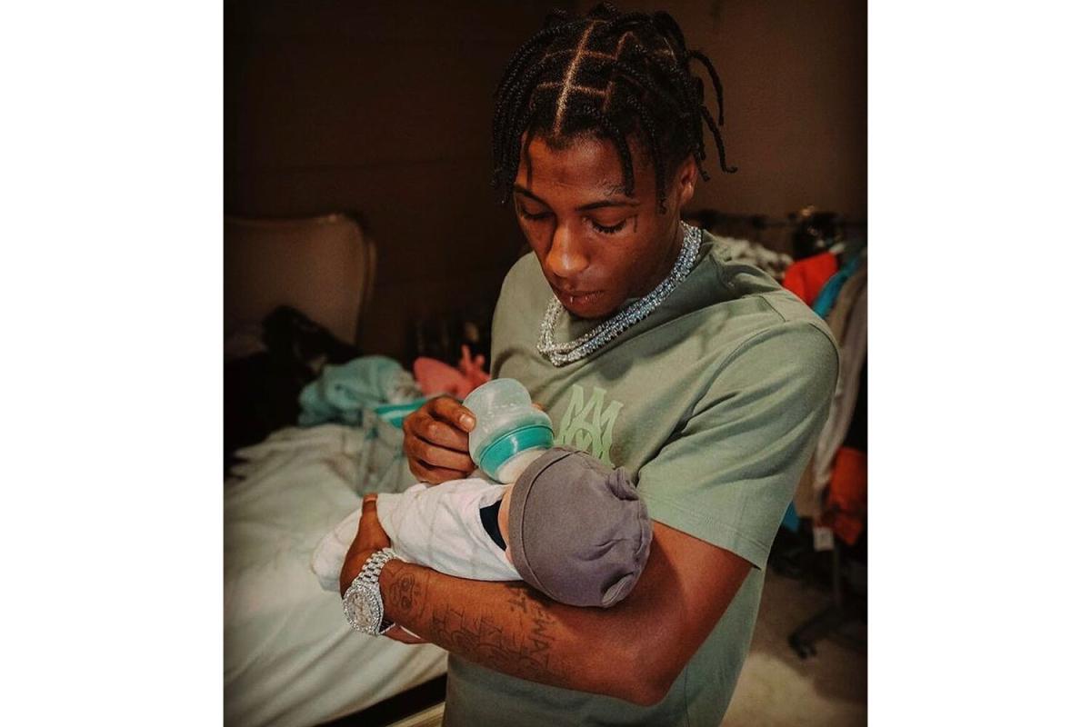 At what age did NBA Youngboy have his first child?