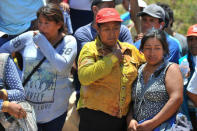 People react after a bus falls into a ravine in Arequipa, Peru February 21, 2018 in this image obtained from social media. Diego Ramos Lupo/Frase Corta via REUTERS