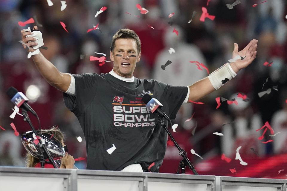 FILE - Tampa Bay Buccaneers quarterback Tom Brady celebrates after defeating the Kansas City Chiefs in the NFL Super Bowl 55 football game in Tampa, Fla., in this Sunday, Feb. 7, 2021, file photo. Jason Licht is enjoying the perks that come with being the general manager of a reigning Super Bowl champion. That includes the challenge of getting a late start on preparing for the NFL draft and not having a selection until the tail end of the first round as the Buccaneers continue to get acclimated to what life’s like with Tom Brady. (AP Photo/Ashley Landis, File)