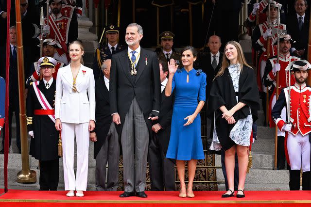<p>Carlos Alvarez/Getty</p> Princess Leonor, King Felipe, Queen Letizia and Princess Sofia take in the military parade on October 31.