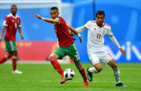 Soccer Football - World Cup - Group B - Morocco vs Iran - Saint Petersburg Stadium, Saint Petersburg, Russia - June 15, 2018 Morocco's Hakim Ziyech in action with Iran's Vahid Amiri REUTERS/Dylan Martinez