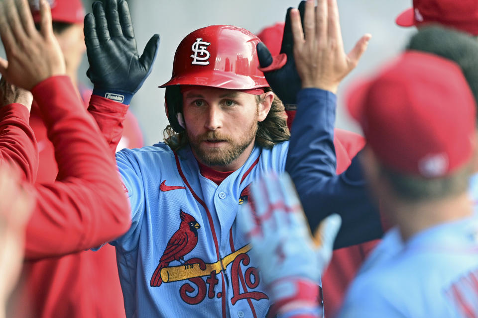 St. Louis Cardinals' Brendan Donovan is congratulated in the dugout after hitting a solo home run off Cleveland Guardians starting pitcher Tanner Bibee during the second inning of a baseball game, Saturday, May 27, 2023, in Cleveland. (AP Photo/David Dermer)