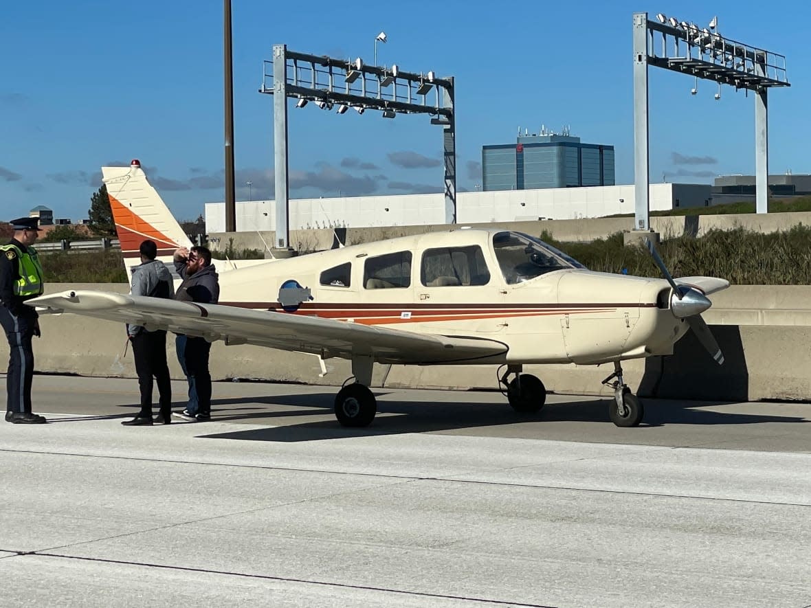 A small plane took off from Buttonville Municipal Airport in Markham, Ont., on Wednesday, but began experiencing mechanical issues and landed on stretch of Highway 407 north of Toronto soon after takeoff.  (Michael Cole/CBC - image credit)