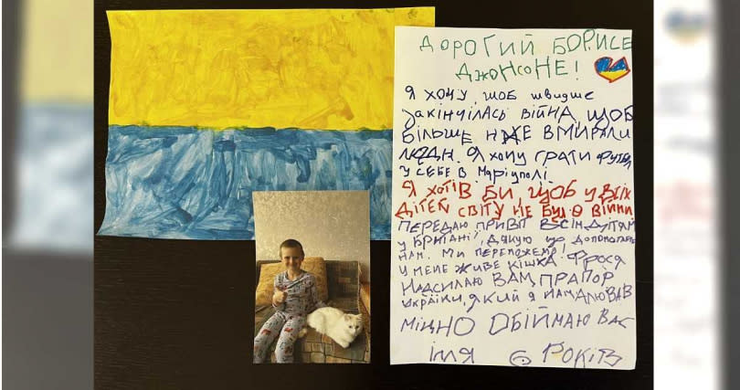 伊利亞在信中附上自己與愛貓的照片，以及手繪的烏克蘭國旗。（圖／翻攝自FC Shakhtar Donetsk官網）