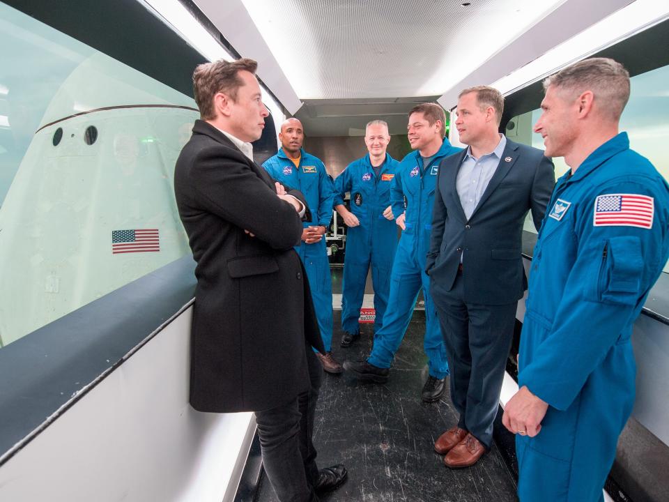 nasa administrator jim bridenstine spacex ceo founder elon musk commercial crew program ccp astronaut launch complex 39a tower crew dragon spaceship spacecraft marc 1 2019 NHQ201903010018_orig