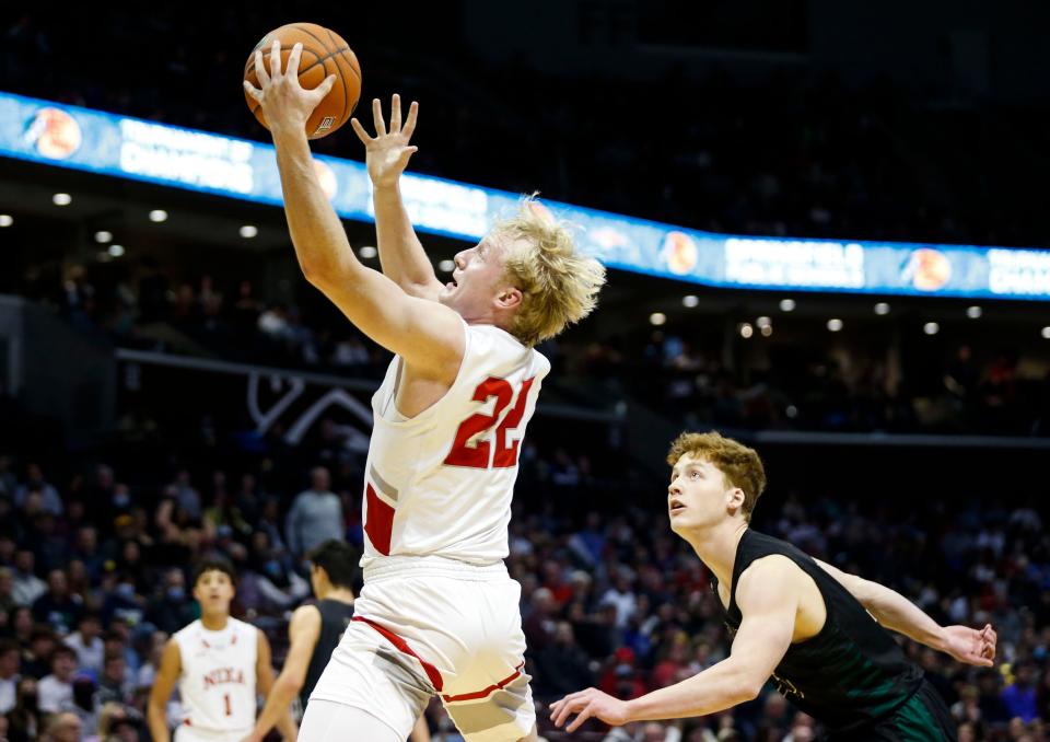 The Springfield Catholic Fightin' Irish took on the Nixa Eagles in the second round of the Bass Pro Shops Tournament of Champions at JQH Arena on Friday, Jan. 14, 2022, 