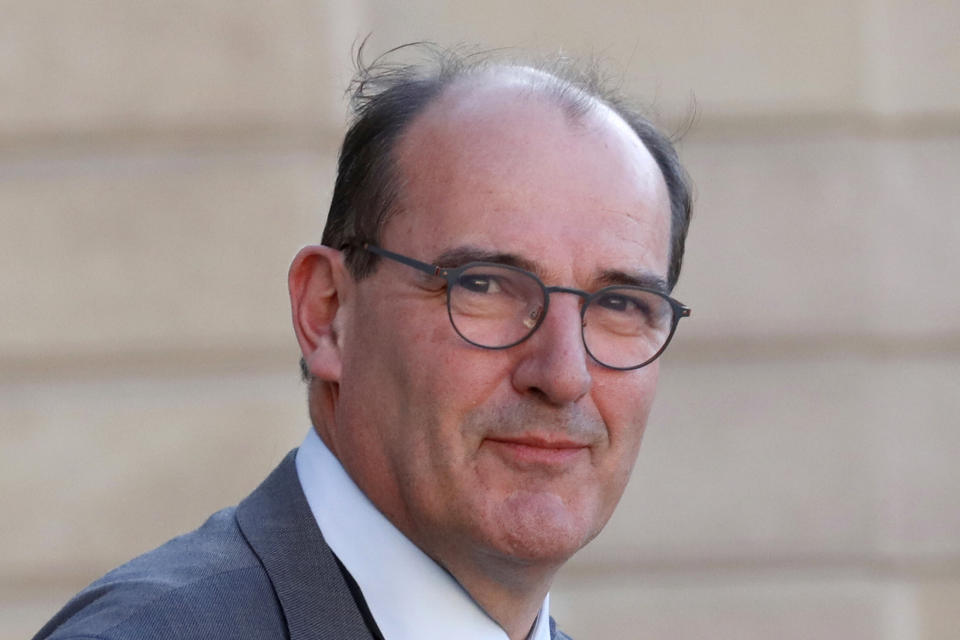 FILE - In this May 19, 2020 file photo, Jean Castex leaves after a videoconference with the French President and French mayors at the Elysee Palace in Paris. French President Emmanuel Macron has named Jean Castex, who coordinated France's virus reopening strategy, as new prime minister on Friday July 3, 2020. Emmanuel Macron is reshuffling the government to focus on reviving the economy after months of lockdown. (Gonzalo Fuentes/Pool via AP, File)