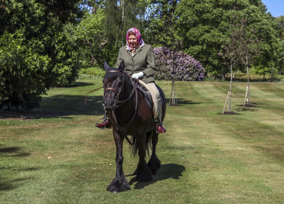 Britain's Queen Elizabeth II rides Balmoral Fern, a 14-year-old Fell Pony, in Windsor Home Park, west of London, over the weekend of May 30 and May 31, 2020. 