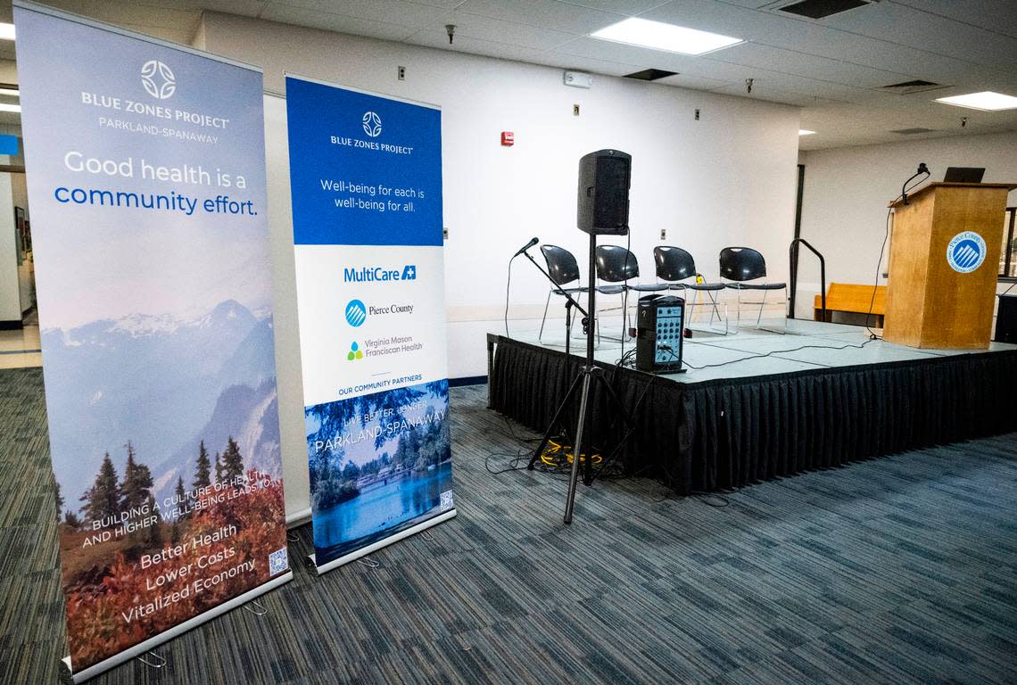 Signs about Blue Zones Project, a collaboration of the local health care systems and Pierce County to improve health outcomes for residents in Parkland and Spanaway, stand in a room in the Sprinker Recreation Center on Dec. 12, 2022.