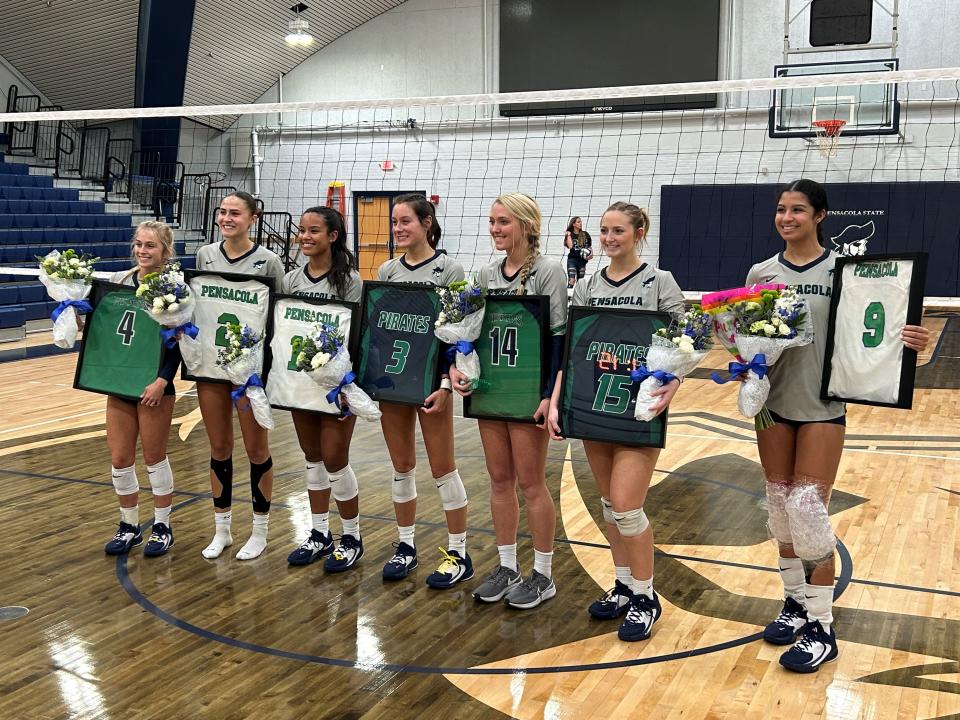 (From left to right) Pensacola State College's Kathryn Lupo, Anyaliz Rodriguez, Kiara Vega, Carly Cooper, Janie Ellis, Lyndi Bakker and Paige Patterson pose for photos on Sophomore Day on Saturday, Sept. 30, 2023 from the Ambersley and Levy Court inside Hartsell Arena.