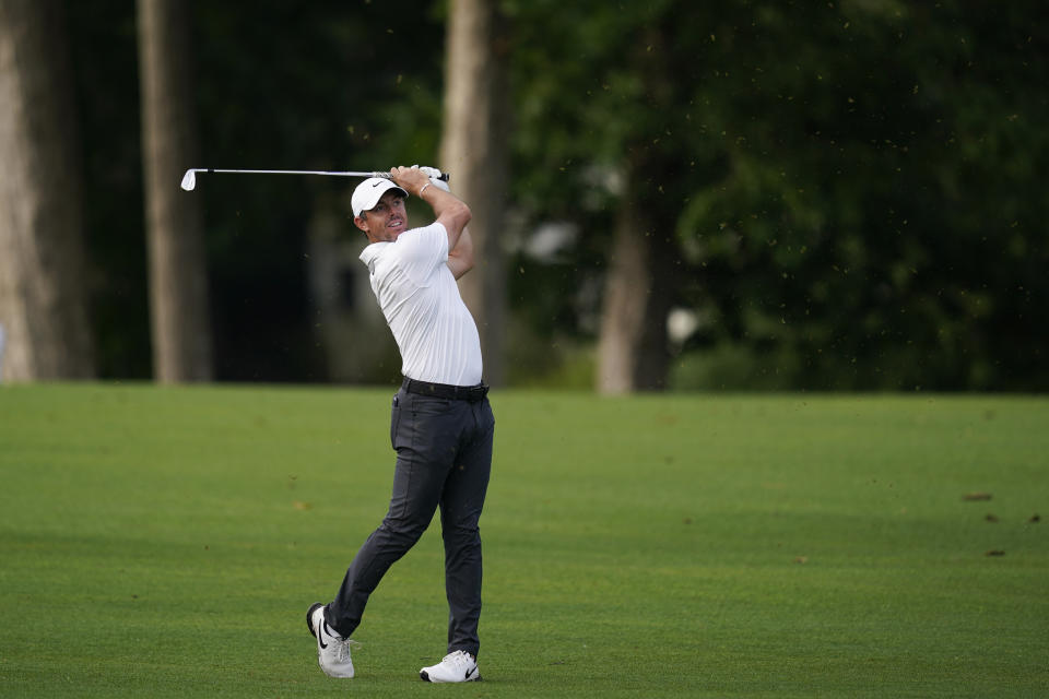 Rory McIlroy, of Northern Ireland, hits from the fairway on the 16th hole during the first round of the Wells Fargo Championship golf tournament at Quail Hollow on Thursday, May 9, 2024, in Charlotte, N.C. (AP Photo/Erik Verduzco)