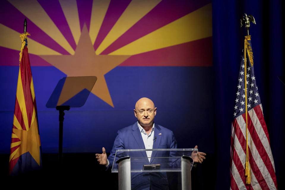 Sen. Mark Kelly, D-Ariz., addresses supporters at an election night event in Tucson, Ariz., Tuesday, Nov. 8, 2022. (AP Photo/Alberto Mariani)