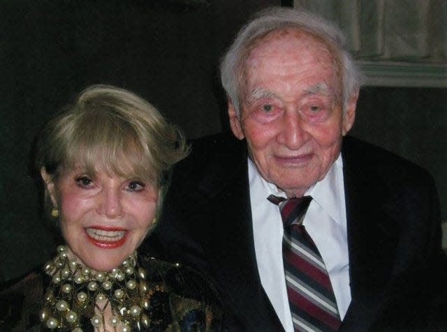 Guilford Glazer, right, and his wife Diane Pregerson Glazer.