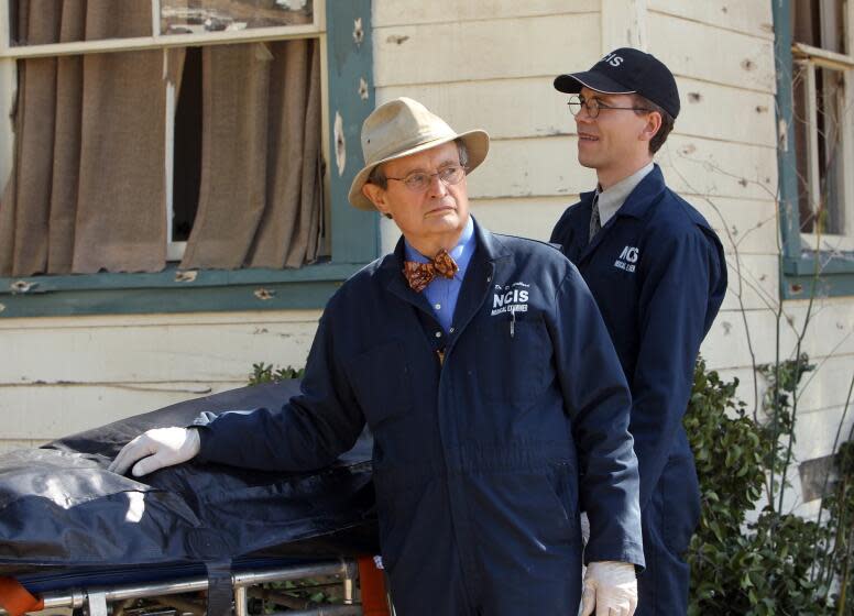 LOS ANGELES - APRIL 4: "Revenge" -- In retaliation for the murders of Eli David and Jackie Vance, the NCIS team feverishly searches for Bodnar despite orders from Homeland Security to relinquish the case, on NCIS, Tuesday, April 30 (8:00-9:00 PM, ET/PT) on the CBS Television Network. Pictured left to right: David McCallum and Brian Dietzen. (Photo by Monty Brinton/CBS via Getty Images)