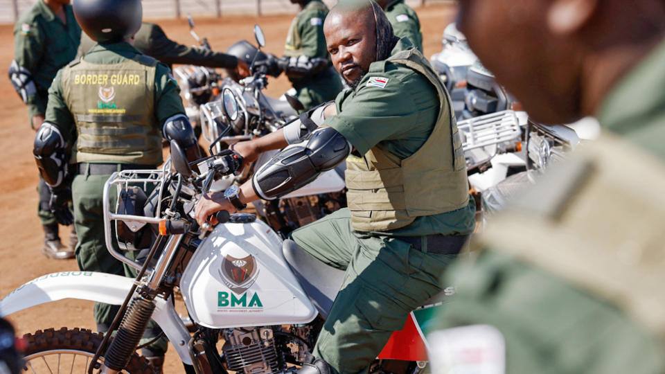 South African Border Management Authority (BMA) officers gather with their motorbikes ahead of the launch of their force at the Musina Show Grounds in Musina, South Africa - 5 October 2023