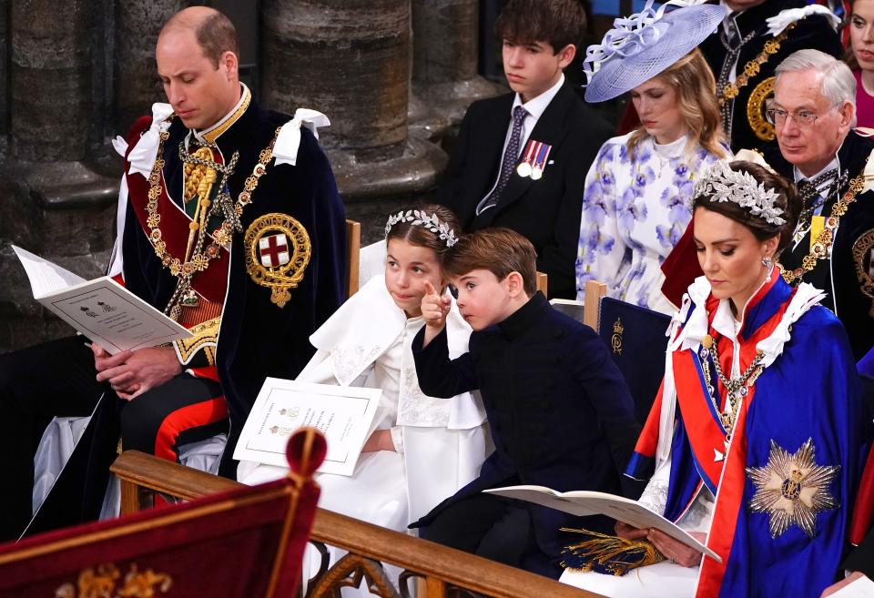 TOPSHOT - (From L) Britain's Prince William, Prince of Wales, Princess Charlotte, Prince Louis and Britain's Catherine, Princess of Wales attend the coronations of Britain's King Charles III and Britain's Camilla, Queen Consort at Westminster Abbey in central London on May 6, 2023. - The set-piece coronation is the first in Britain in 70 years, and only the second in history to be televised. Charles will be the 40th reigning monarch to be crowned at the central London church since King William I in 1066. Outside the UK, he is also king of 14 other Commonwealth countries, including Australia, Canada and New Zealand. Camilla, his second wife, will be crowned queen alongside him, and be known as Queen Camilla after the ceremony. (Photo by Yui Mok / POOL / AFP) (Photo by YUI MOK/POOL/AFP via Getty Images)