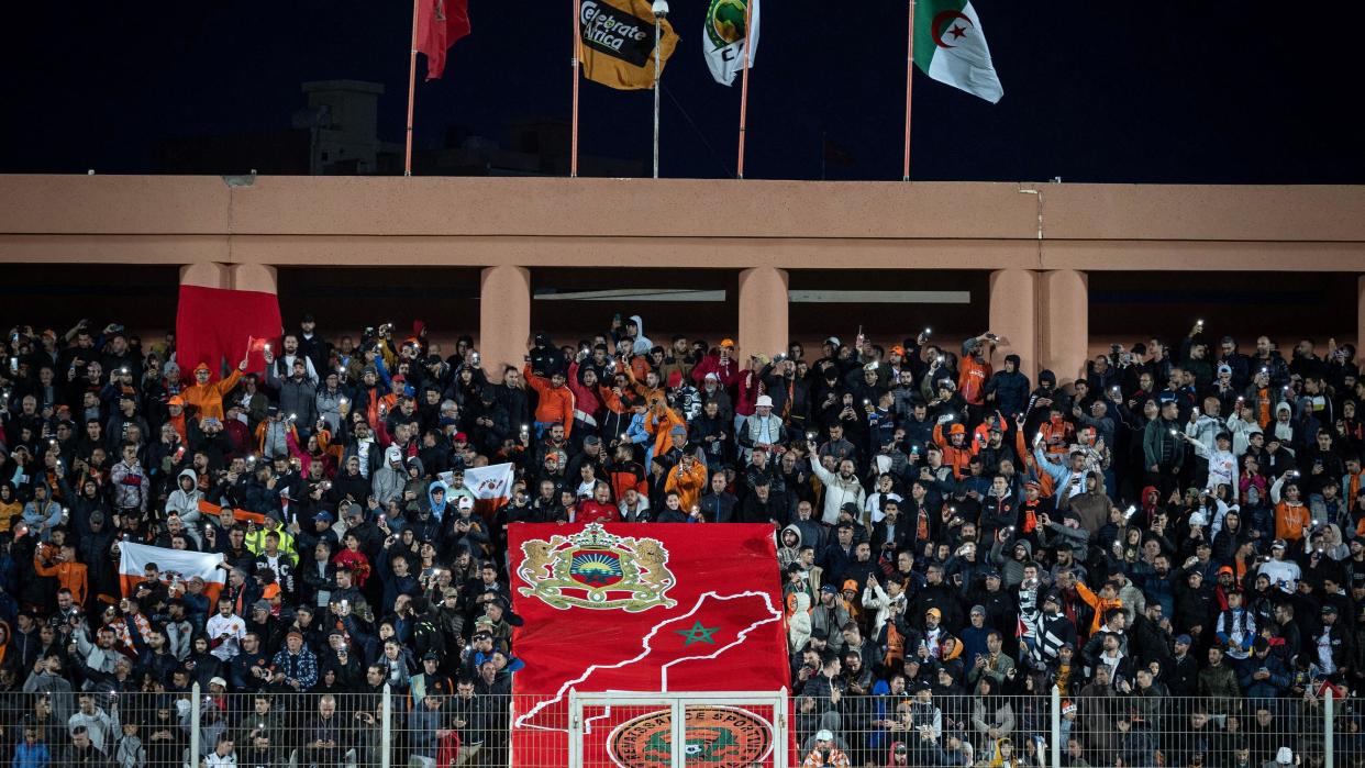 Fans of RS Berkane hold banners before the second leg of the Caf Confederation Cup football semi-final match against Algeria's USM Alger 