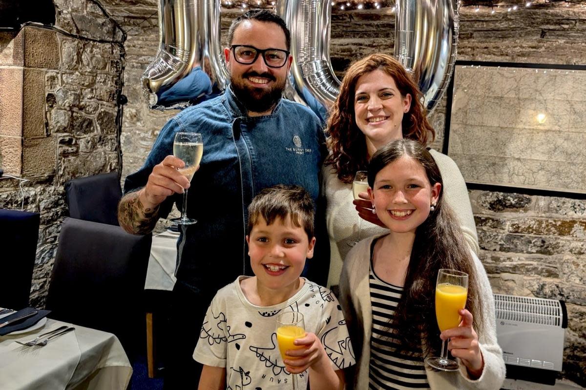 Chef Mark Byron celebrates his tenth anniversary at Le Caveau with his wife, Esther and children Phoebe and George <i>(Image: Alistair Fox)</i>