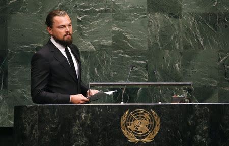 U.S. actor and UN Messenger of Peace Leonardo DiCaprio takes the podium to speak during the Climate Summit at United Nations Headquarters in New York, September 23, 2014. REUTERS/Mike Segar