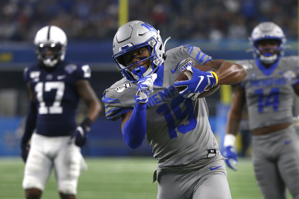 Memphis running back Kenneth Gainwell (19) carries the ball against the Penn State in the first half of the NCAA Cotton Bowl college football game, Saturday, Dec. 28, 2019, in Arlington, Texas. (AP Photo/Ron Jenkins)