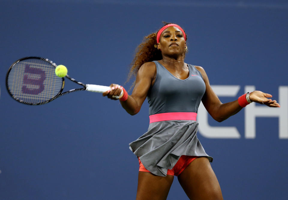 NEW YORK, NY - AUGUST 26:  Serena Williams of the United States of America plays a forehand against Francesca Schiavone of Italy during their women's singles first round match on Day One of the 2013 US Open at USTA Billie Jean King National Tennis Center on August 26, 2013 in the Flushing neighborhood of the Queens borough of New York City.  (Photo by Matthew Stockman/Getty Images)