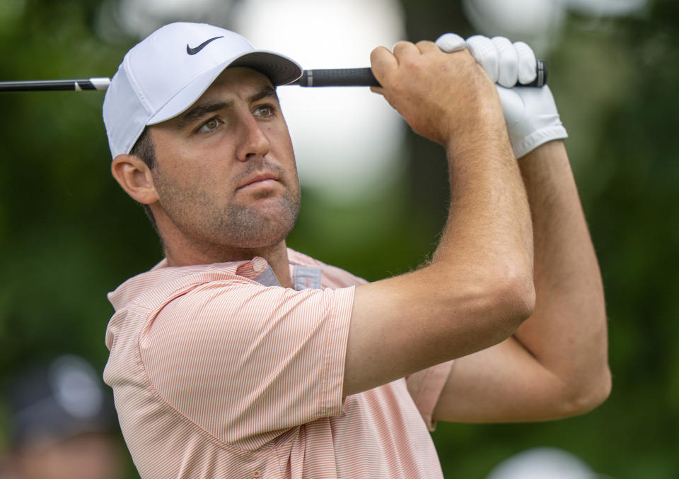 Scottie Scheffler of the United States watches his tee shot on the first hole in the third round of the Canadian Open golf tournament in Toronto on Saturday, June 11, 2022. (Frank Gunn/The Canadian Press via AP)