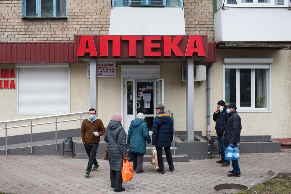 Civilians queue for a pharmacy in Kramatorsk, Ukraine.