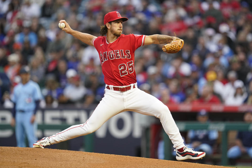 Los Angeles Angels starting pitcher Michael Lorenzen (25) throws during the first inning of a baseball game against the Toronto Blue Jays in Anaheim, Calif., Saturday, May 28, 2022. (AP Photo/Ashley Landis)