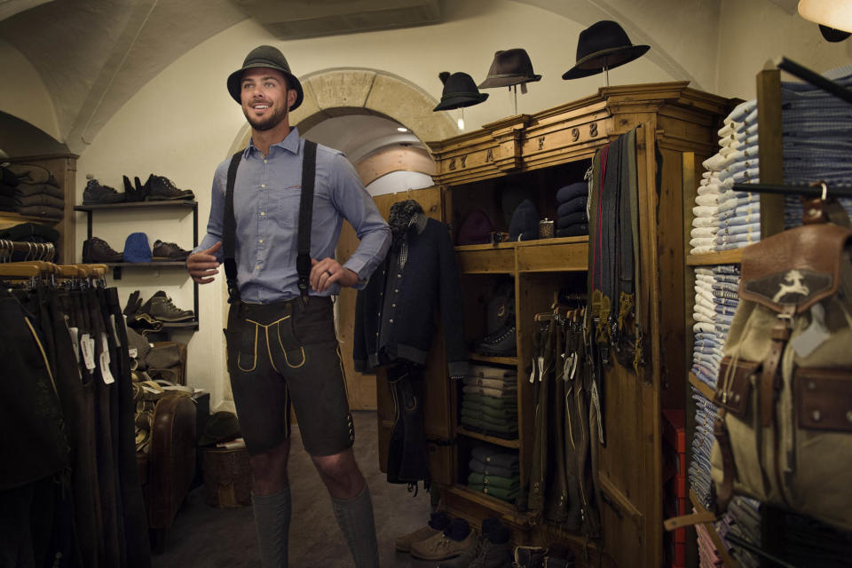 Kris Bryant tries on lederhosen while on vacation in Austria. (Photo via Red Bull)