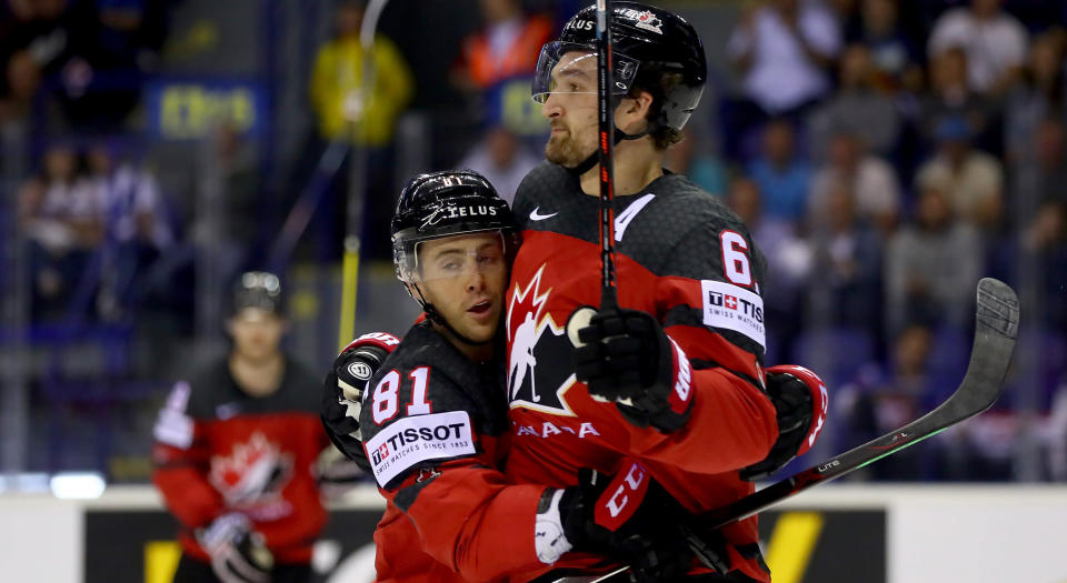 Mark Stone celebrates with team mate Jonathan Marchessault after his third goal against Germany. 