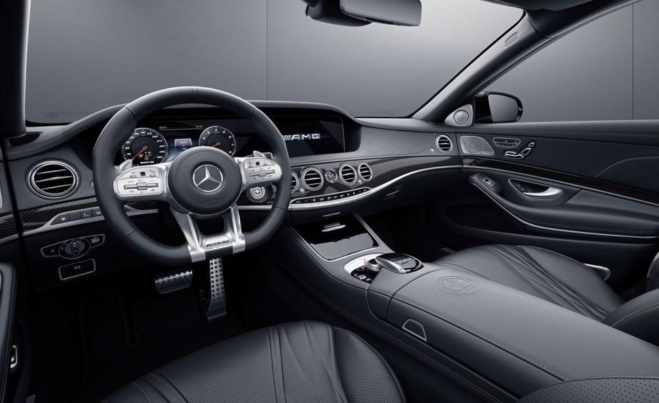 <p>Inside, Mercedes-AMG stylists have carried over the black and bronze theme in a subtle way by including black Nappa leather with bronze stitching, carbon fiber trim with black and bronze threads, copper-colored ambient lighting, and floor mats with bronze details.</p>