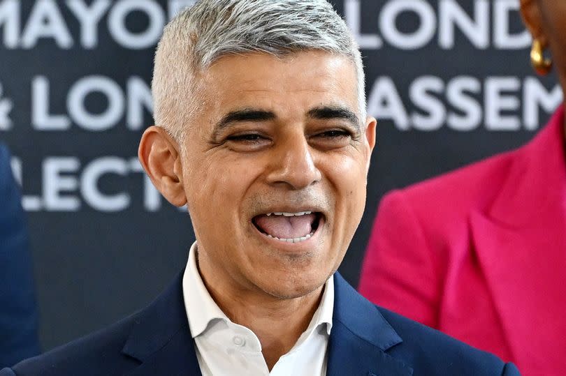Incumbent Labour Mayor, Sadiq Khan, smiles after winning an historic third term in office