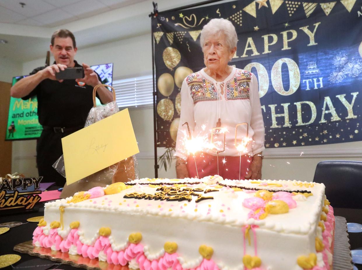 Elizabeth Parisi alongside Port Orange Mayor Don Burnette, Wednesday, Oct. 11, 2023, during her 100th birthday celebration at the Adult Activity Center.