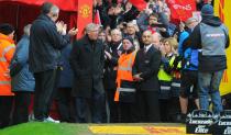 Manchester United manager Sir Alex ferguson walks on to the pitch before taking his seat for his last Barclays Premier League match at Old Trafford, Manchester.