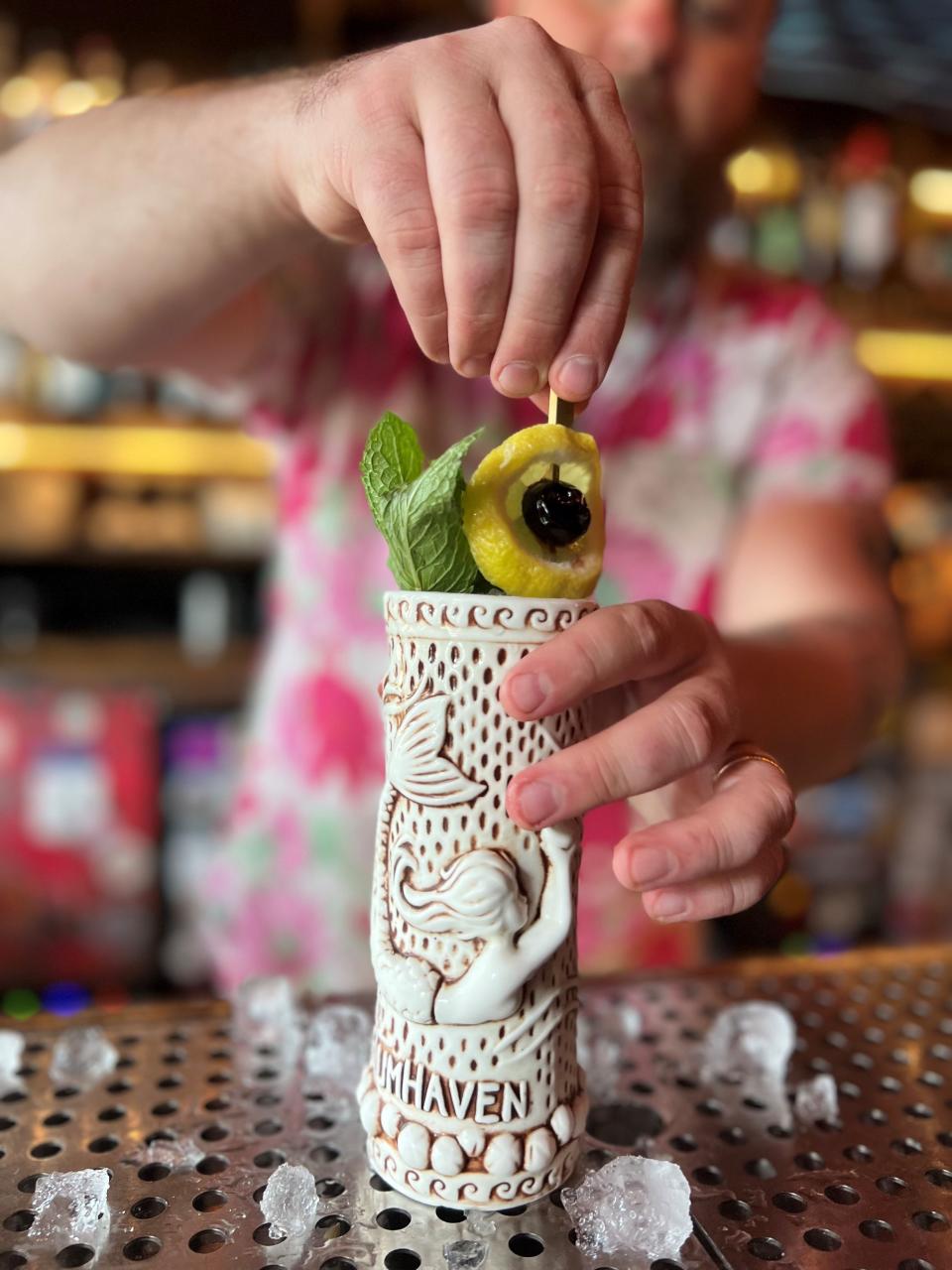 Mary's B.O.T.E. (Bar of Tropical Escapism) is a new tropical bar set to open in early 2024 in Midtown Memphis. The new concept is from Cameo owners Mary Oglesby and Paul Gilliam (pictured making a cocktail).