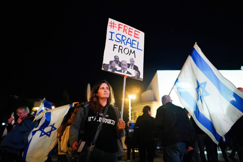 People protest against Israeli Prime Minister Benjamin Netanyahu's government in Tel Aviv