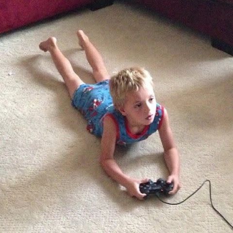 <p>Britney Spears/Instagram</p> Jayden James playing a video game