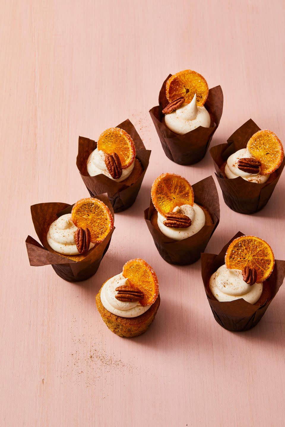 <p>Made with finely ground pecans, cinnamon and nutmeg, these spiced cupcakes are perfect for any fall holiday.</p><p>Get the <a href="https://www.goodhousekeeping.com/food-recipes/a36972545/pecan-cupcakes-with-spiced-vanilla-frosting-recipe/" rel="nofollow noopener" target="_blank" data-ylk="slk:Pecan Cupcakes With Spiced Vanilla Frosting recipe;elm:context_link;itc:0;sec:content-canvas" class="link "><strong>Pecan Cupcakes With Spiced Vanilla Frosting recipe</strong></a><em>.</em></p>