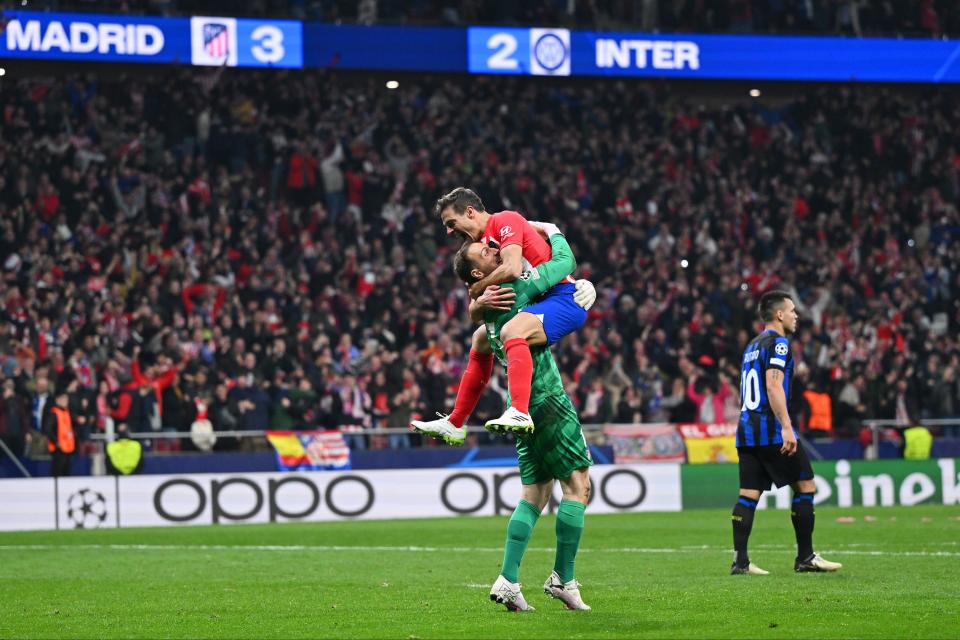 Jan Oblak and Cesar Azpilicueta celebrate Atletico’s shootout win (Getty Images)