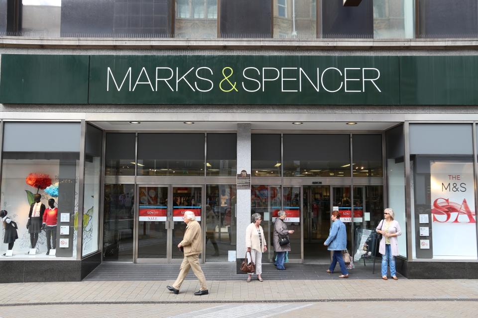 LEEDS, UK - JULY 12, 2016: People shop at Marks and Spencer department store in downtown Leeds, UK. M&S is a major retailer with 1,010 stores in 41 countries. It specializes in fashion and luxury goods.