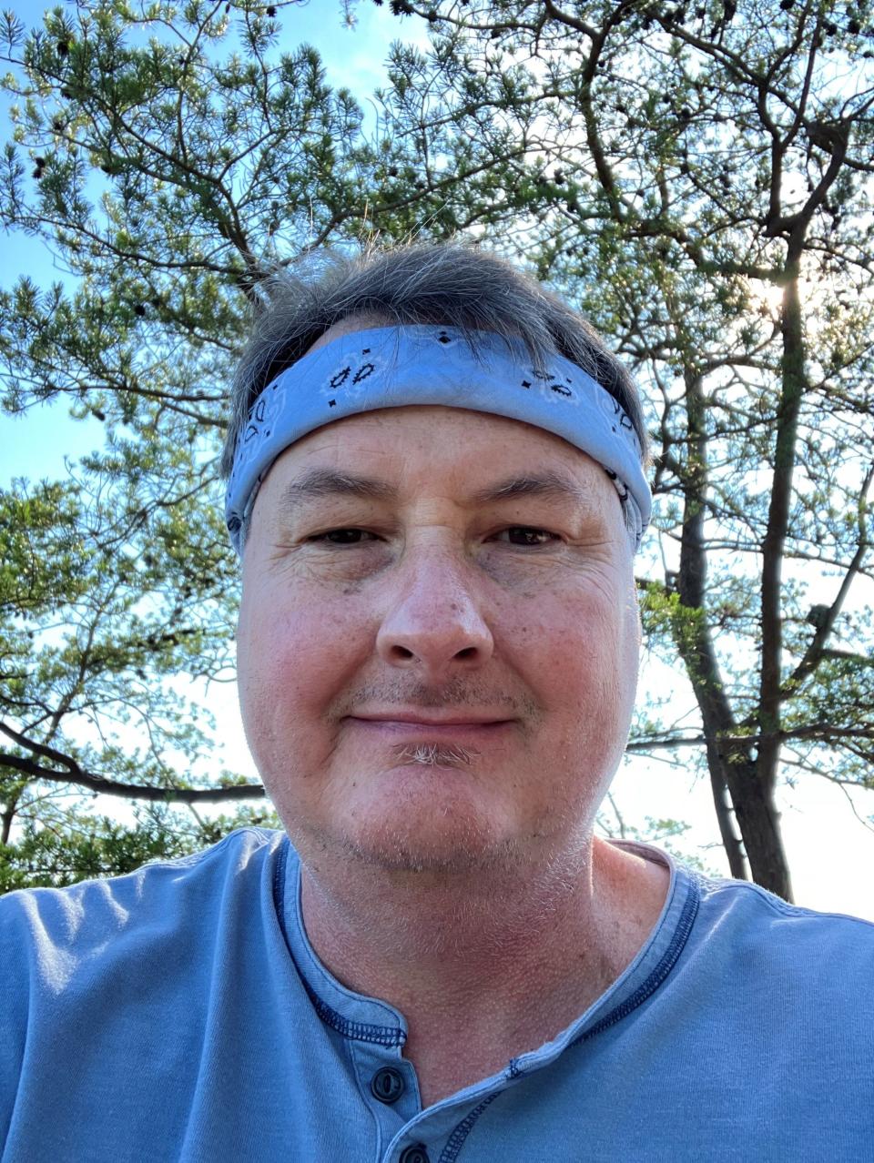 I took this selfie while sitting on a slab of sandstone at the end of Long Point Trail.