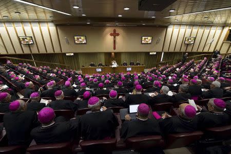 Pope Francis speaks during the opening session of an Italian Episcopal Conference meeting at the Vatican City, May 18, 2015. REUTERS/Osservatore Romano