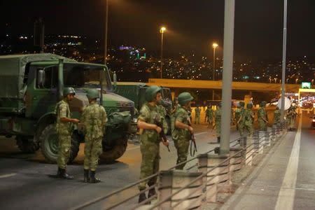 Turkish military block access to the Bosphorus bridge, which links the city's European and Asian sides, in Istanbul, Turkey, July 15, 2016. REUTERS/Stringer