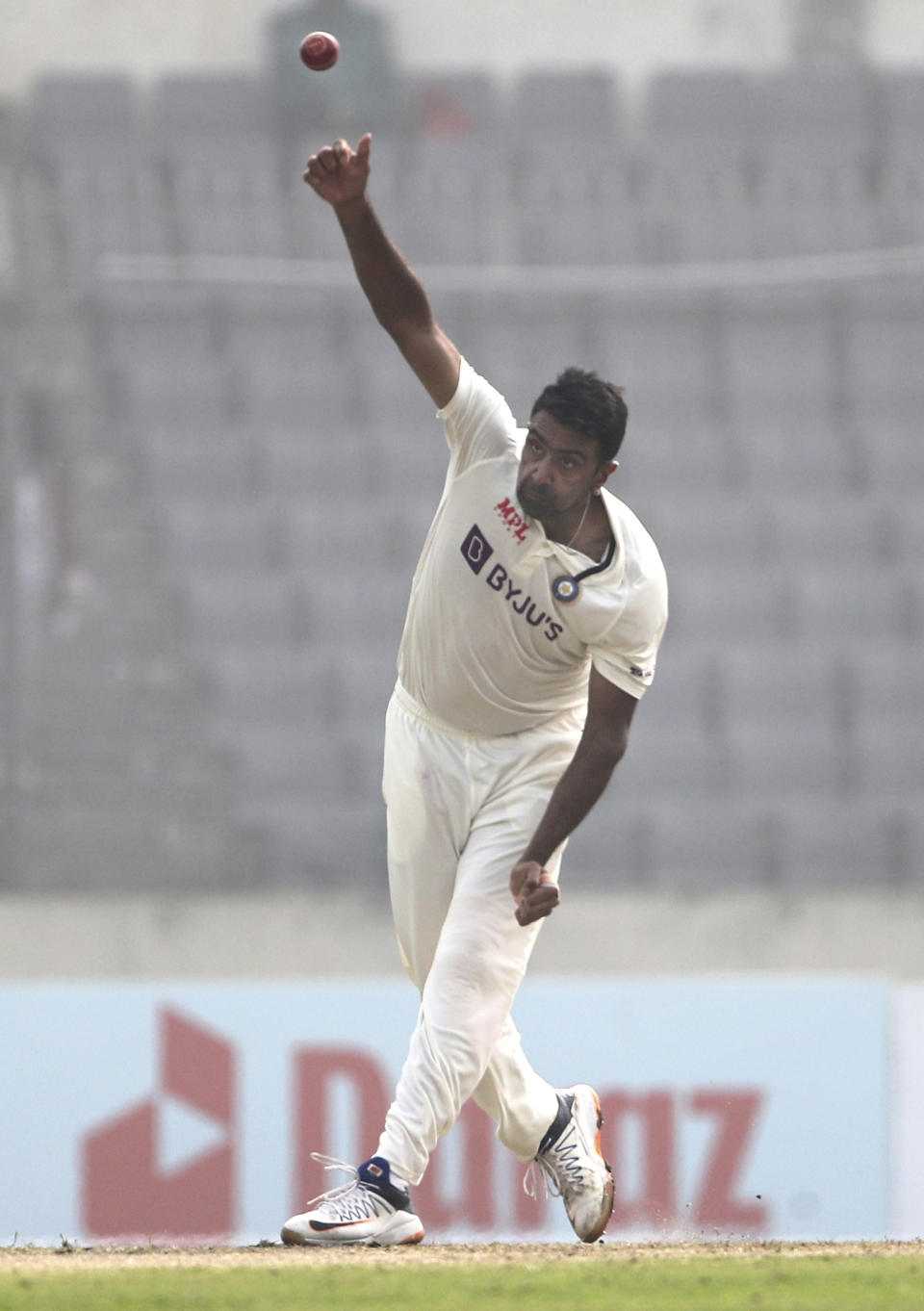 India's Ravichandran Ashwin bowls on the day one of the second test cricket match Bangladesh between India, in Dhaka, Bangladesh, Thursday, Dec. 22, 2022. (AP Photo/Surjeet Yadav)