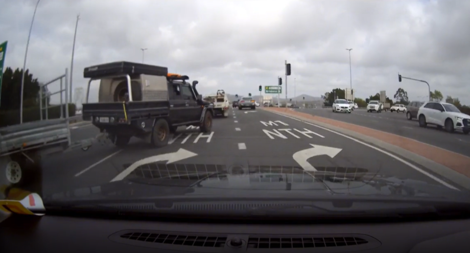 The Landcruiser driver merging into a lane in front of the P-plater getting onto the onramp of the M1 in Oxenford on the Goldcoast. 