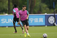 Inter Milan's Hakan Calhanoglu trains during a media day ahead of the Champions League soccer final, at the Suning training center, in Appiano Gentile, northern Italy, Monday, June 5, 2023. Inter Milan will play a Champions League final against Manchester City in Istanbul, Turkey, next Saturday, June 10. (AP Photo/Antonio Calanni)